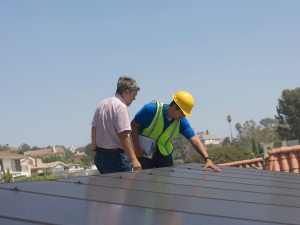 A completed roof repair with a satisfied homeowner and a Napa County roofer