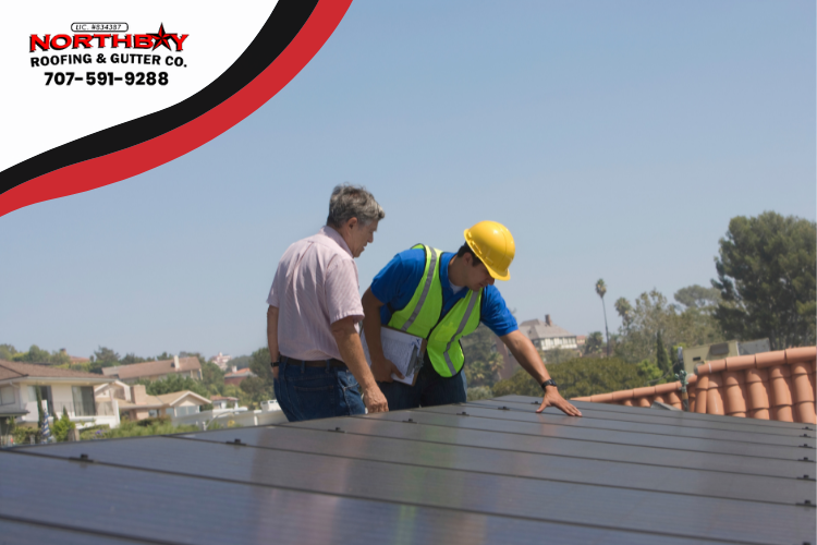 Napa roofer from Northbay Roofing & Gutter Co. inspecting a roof under the summer sun.