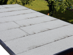 Calistoga roofing contractor inspecting a flat roof for winter-proofing